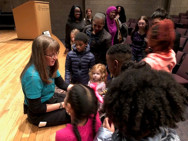 teacher explaining to the students